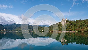 Beautiful panoramic view of lake Bled landscape with the Castle of Bled and Church of Saint Martin.