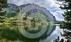 Beautiful panoramic view of Popradske pleso (once called Rybie pleso) is a mountain lake of glacial origin located in the High