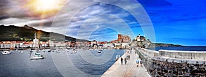Beautiful panoramic view of the port city of Castro Urdiales, Cantabria. Tourism in coastal towns, northern Spain photo