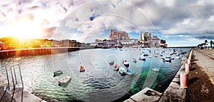 Beautiful panoramic view of the port city of Castro Urdiales. Fishing village and pier of Cantabria. photo