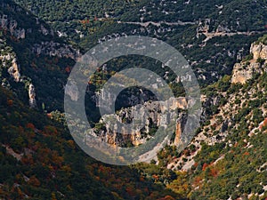 Beautiful panoramic view of steep canyon Gorges de la Nesque with rugged limestone rocks on the slopes in France.