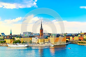 Beautiful panoramic view of Stockholm Old town Gamla Stan with a cruise ship. Summer sunny day in Stockholm, Sweden