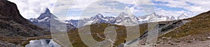 Beautiful panoramic view of Swiss Alps with Matterhorn and Riffelsee Lake on the left