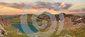 Beautiful panoramic view to lunersee and austrian alps at sunset