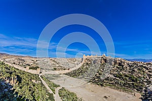 Beautiful panoramic view of the walls of the Alcazaba de Almeria in Spain on a rocky terrain