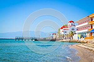 Beautiful Paralia Katerini beach and church, Greece photo