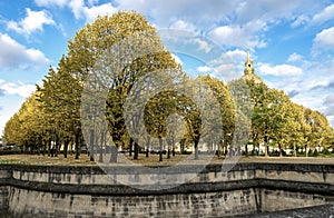 A beautiful park with colorful autumn trees near Les Invalides complex and Cathedral, Paris