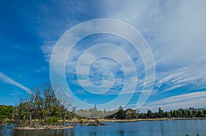 Beautiful parklands with lake and clouds with blue sky in the background, Sydney, Australia.