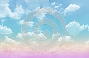 Beautiful pastel color with rainbow shade on white fluffy clouds, colorful blue sky on background, upward view and copy space