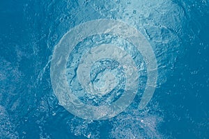 Beautiful pattern of blue water reflecting.