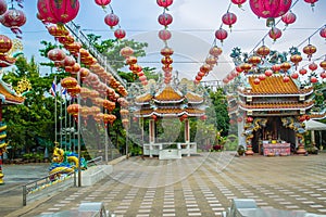 Beautiful Pattern of Chinese Red Lanterns Decorated between the pavilions at the public Chinese temple in the Celebrate of the