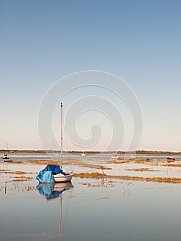 beautiful peaceful harbour scene estuary maldon boat mast reflections