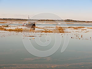 beautiful peaceful harbour scene estuary maldon boat mast reflections