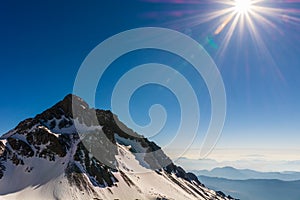 Beautiful and peaceful scenery of snow mountain peak in morning sunlight veiw from Jade Dragon Snow mountain`s viewpoint, Lijiang