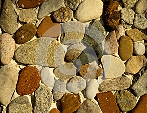 Beautiful pebbles decorate the fence calin photo