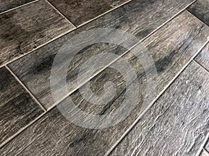 Beautiful perspective shot of the newly installed luxury tile floor .