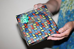 Beautiful photo of a gift wrapped in beautiful paper photo