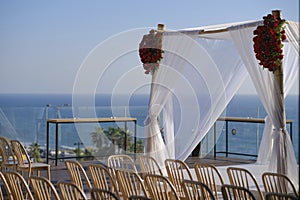 Beautiful photo of the Jewish Hupa , wedding putdoor .