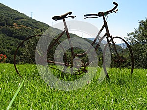 Beautiful photo of a rusty old bicycle and abused