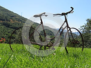 Beautiful photo of a rusty old bicycle and abused photo