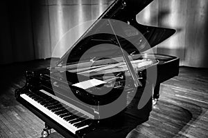 Beautiful piano in concert hall photo