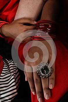 Beautiful picture of indian woman hand with golden ring..