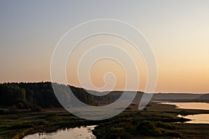 A beautiful picture of the river on the autumn evening. Sunset, landscape photography