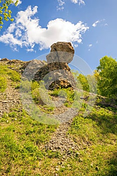 beautiful picturesque rocky outlier of Sualtash in the Orenburg region against the sky