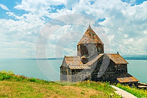 Beautiful picturesque view of the ancient monastery Sevanavank on the shores of Lake Sevan