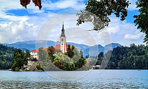 Beautiful Pilgrimage Church of the Assumption of Maria on a small island at Lake Bled Blejsko Jezero