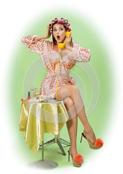 Beautiful pin-up girl in curlers