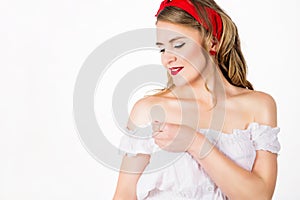 Beautiful pin-up girl over a white background