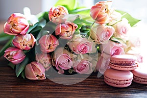 Beautiful pink bouquet of flowers and fine delicacies