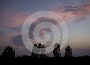 Beautiful pink clouds during sunset, blue sky with clouds background.