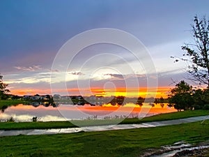 Beautiful pink, orange and blue sunset reflecting on a lake