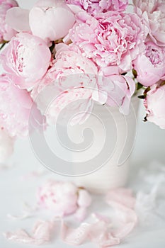 Beautiful pink peony flowers bouquet in vase