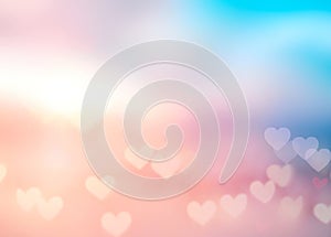 Beautiful pink romantic bokeh. Blurred hearts texture.Valentine`s day background.Glowing love backdrop