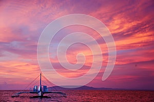 Beautiful pink sunset on the sea in alona panglao bohol philippines