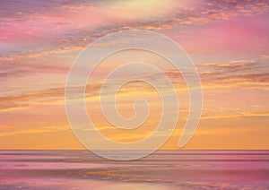 Beautiful pink sunset at sea  water reflection sun light on  gold yellow  clouds sky  nature background