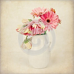 Beautiful Pink and Yellow Wilting Gerbera Daisy Bouquet in a Vase. Artistic.