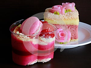 Beautiful pink yogurt cake decorate with macaron and strawberry