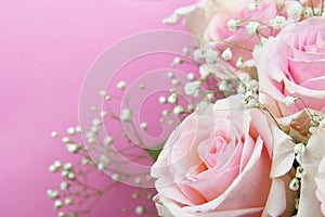 Beautiful pinke rose flowers bouquet in a corner