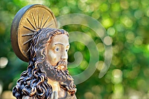 Beautiful plaster image of Jesus Christ outdoors