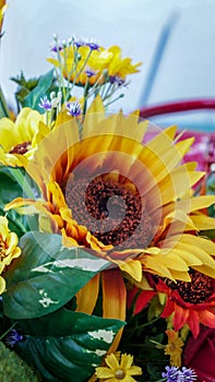 Beautiful plastic sunflower ready to be sold photo