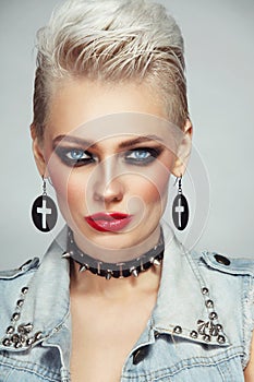 Beautiful platinum blond woman with 80s style makeup