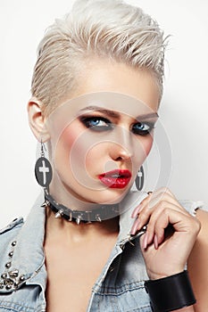 Beautiful platinum blond woman with 80s style makeup