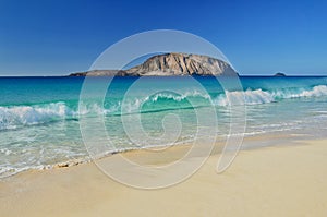 Beautiful Playa de las Conchas with Montana Clara in the background. The island La Graciosa, belonging to Lanzarote, Canary