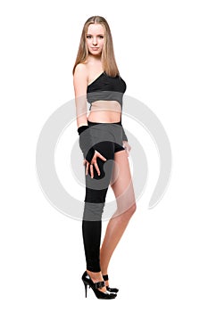 Beautiful playful young woman in skintight black costume photo
