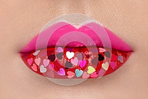 Beautiful plump pink lips with pasted hearts