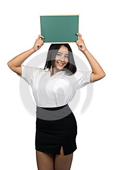 Beautiful plus size Asian woman holding a small blank green chalkboard